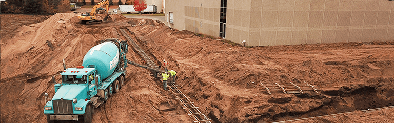 Pouring Concrete foundation for KEB America's building expansion