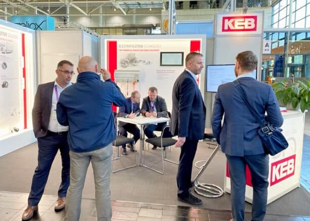 KEB automation employees in a booth at the IAA transportation trade show